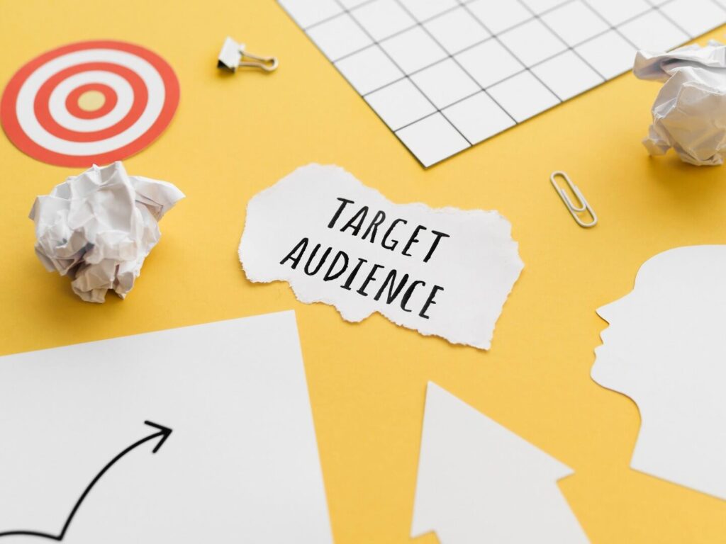 high-angle-piece-paper-with-target-audience_1440x1080
